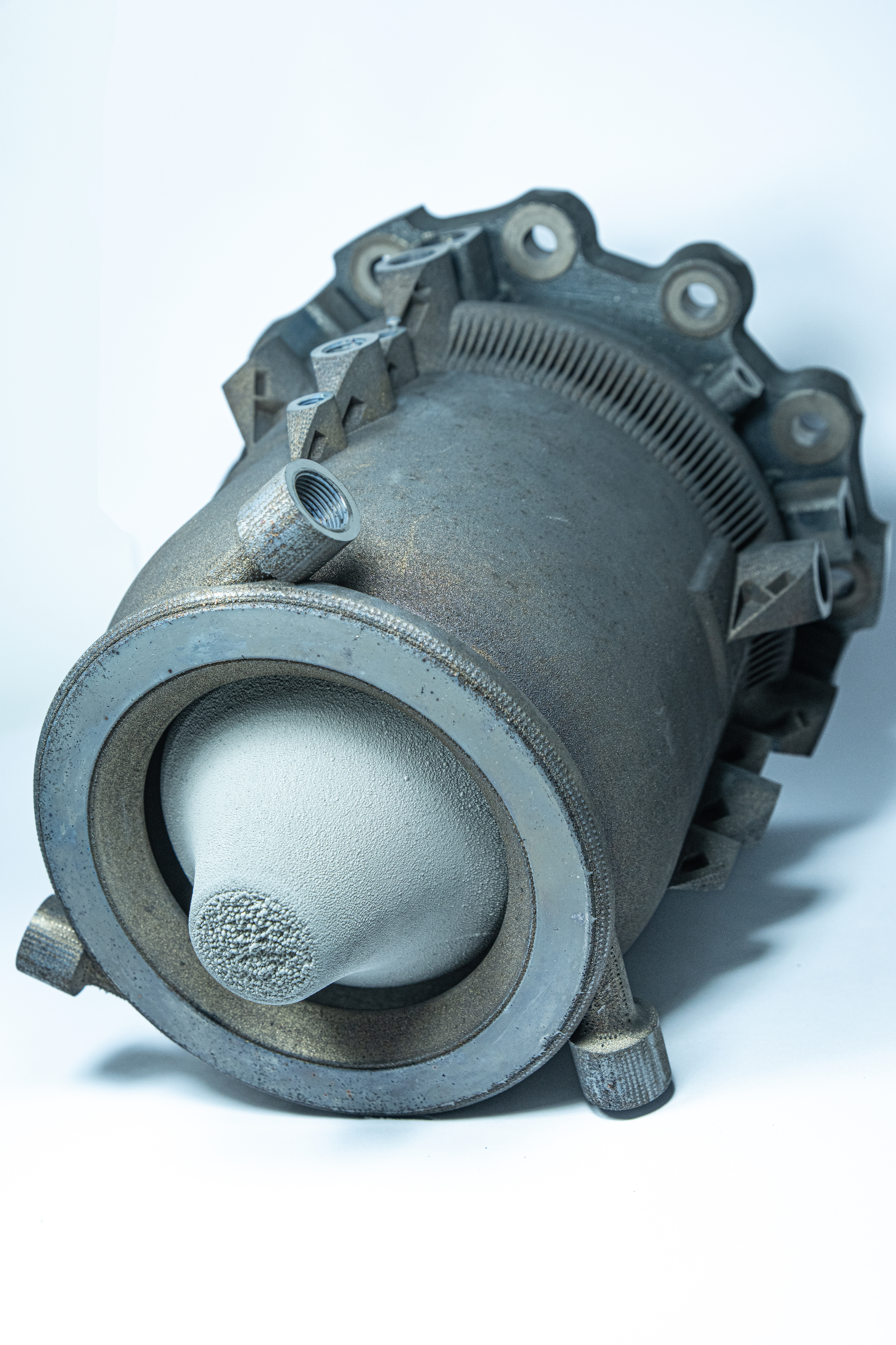 Additively manufactured aerospike engine with thermal coating of the spike and complex internal cooling channels.